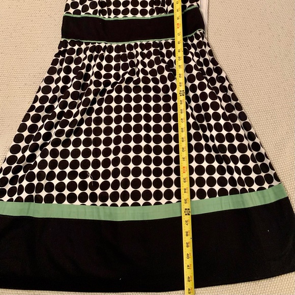 Black and white polkadot sleeveless swing dress - Picture 4 of 14